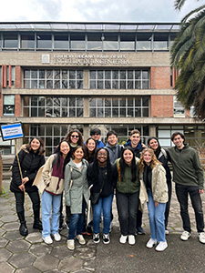 The group in front of PUC's engineering building